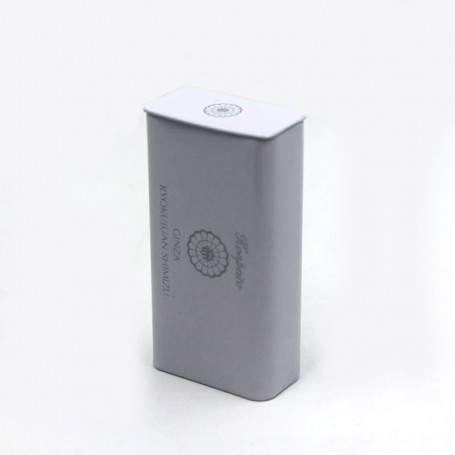 small hinged metal box