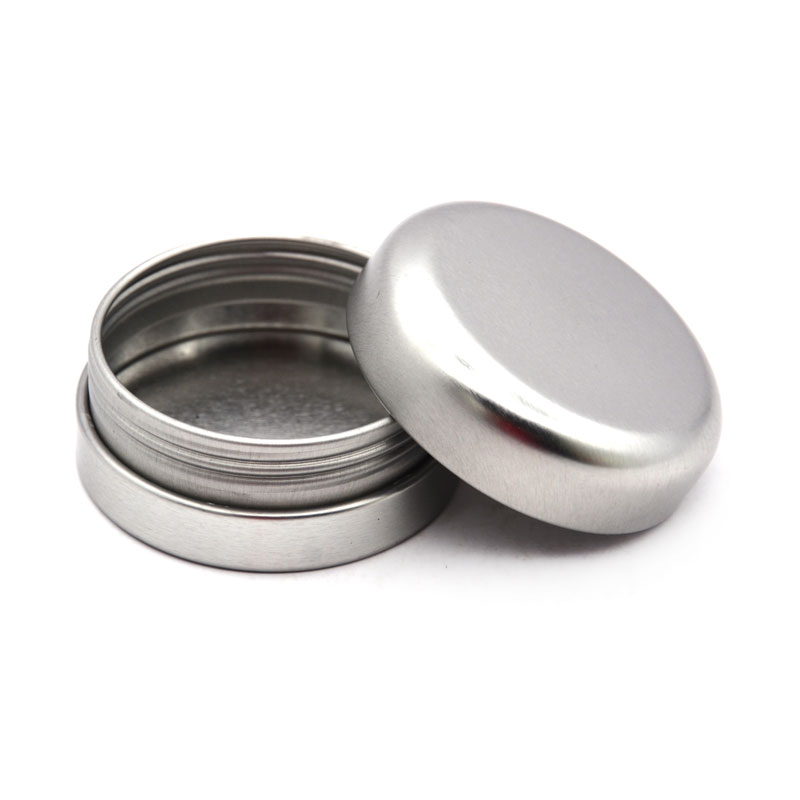 Round tin can with screw lid