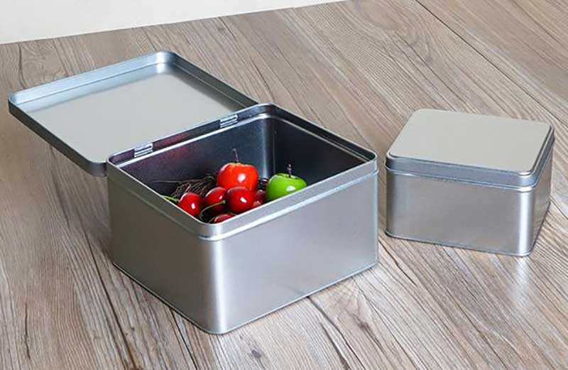 Metal storage box with hinged lid